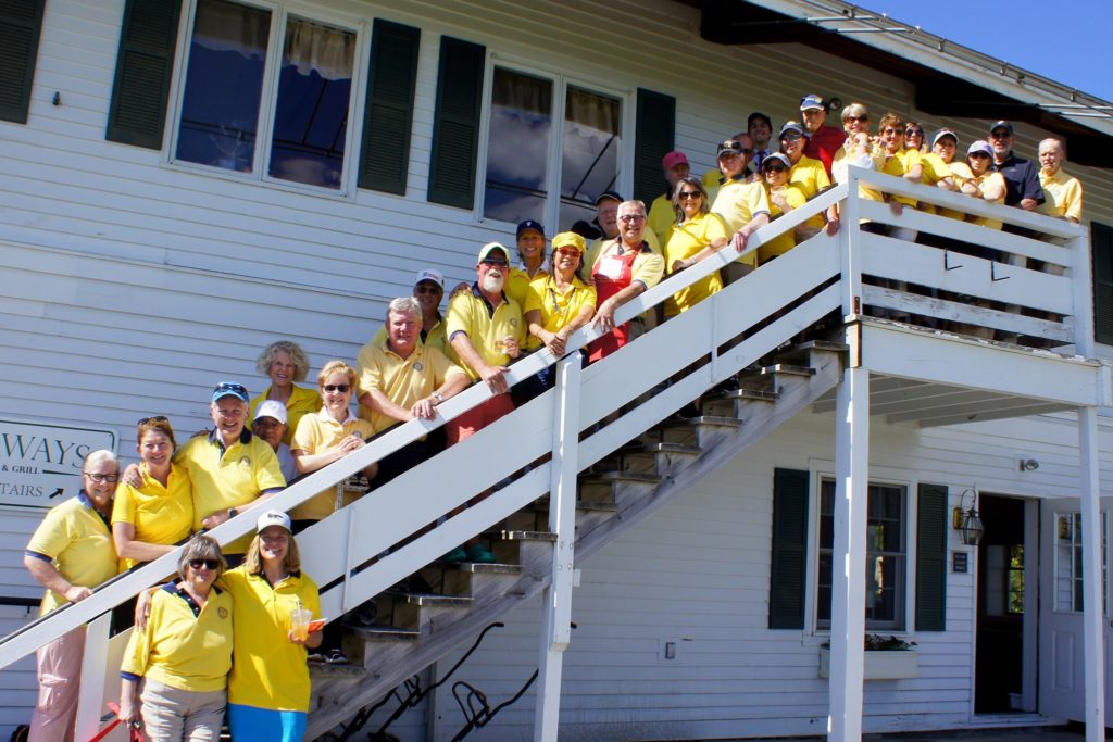 Deerfield valley rotary club members in yellow shirts.